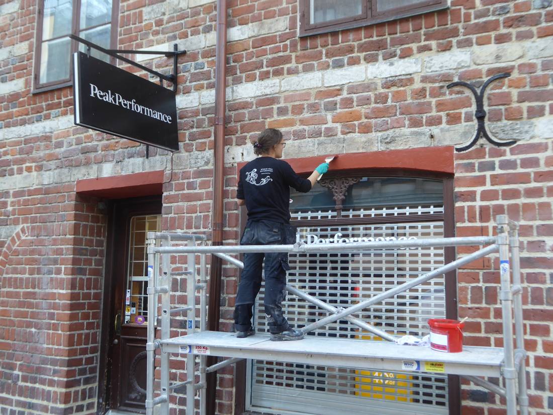 Painter and varnisher, at work