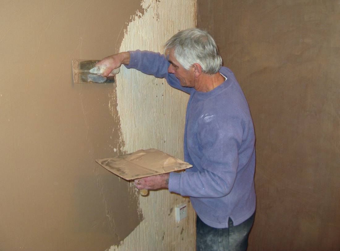 Plasterer, stucco worker, at work