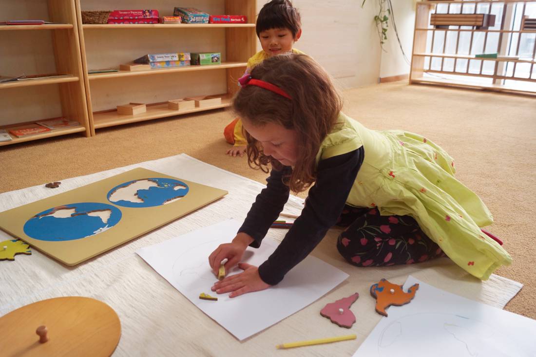 Early childhood educator, childcare worker, at work