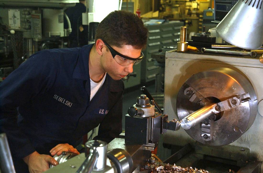 Metal cutting machining operator, at work