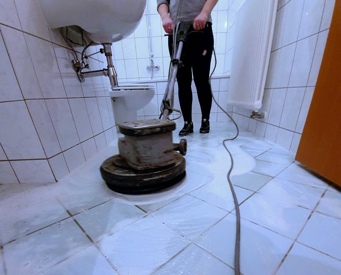 Building cleaner, at work