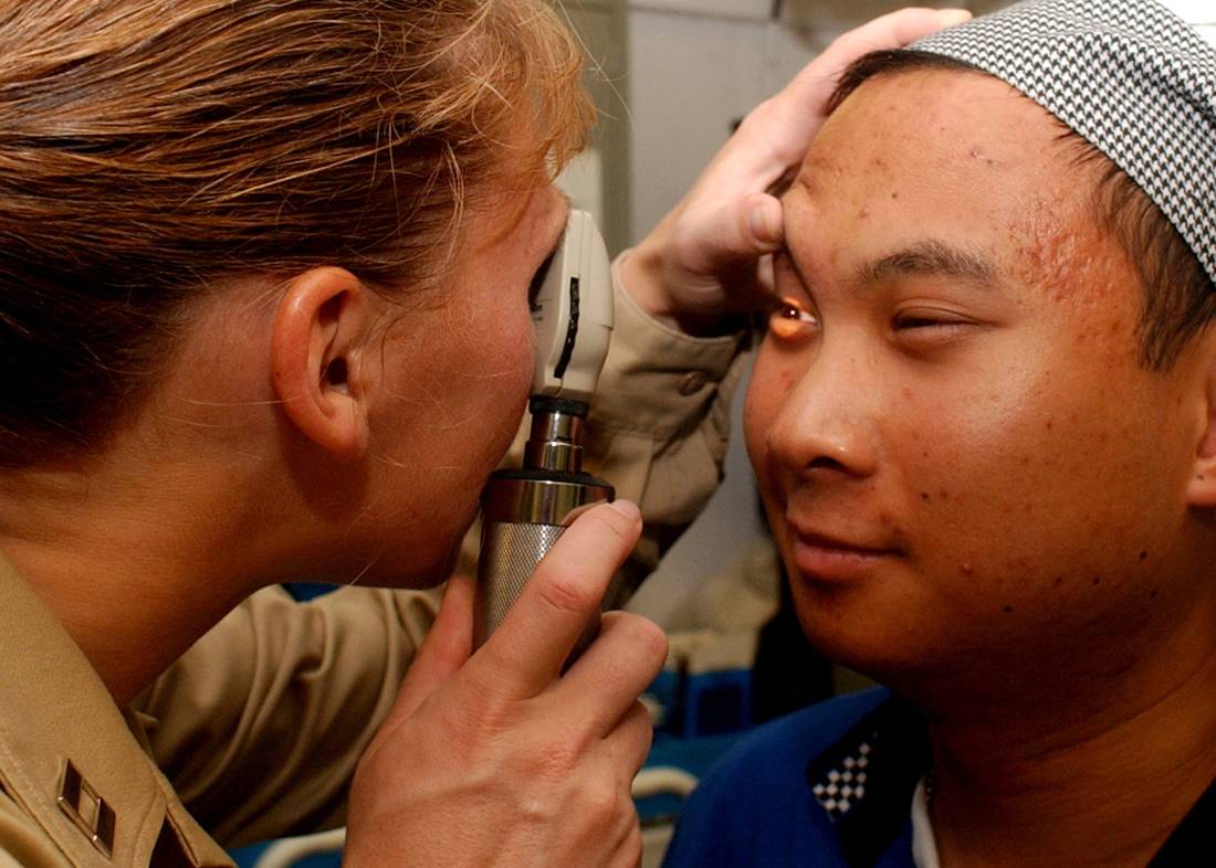 Specialist physician (dermatology, sensory organs, genito-urinary system), at work