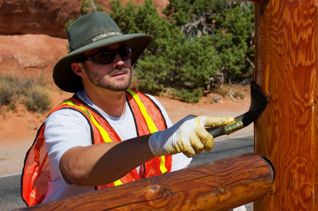 Railway infrastructure monitoring and maintenance worker, at work